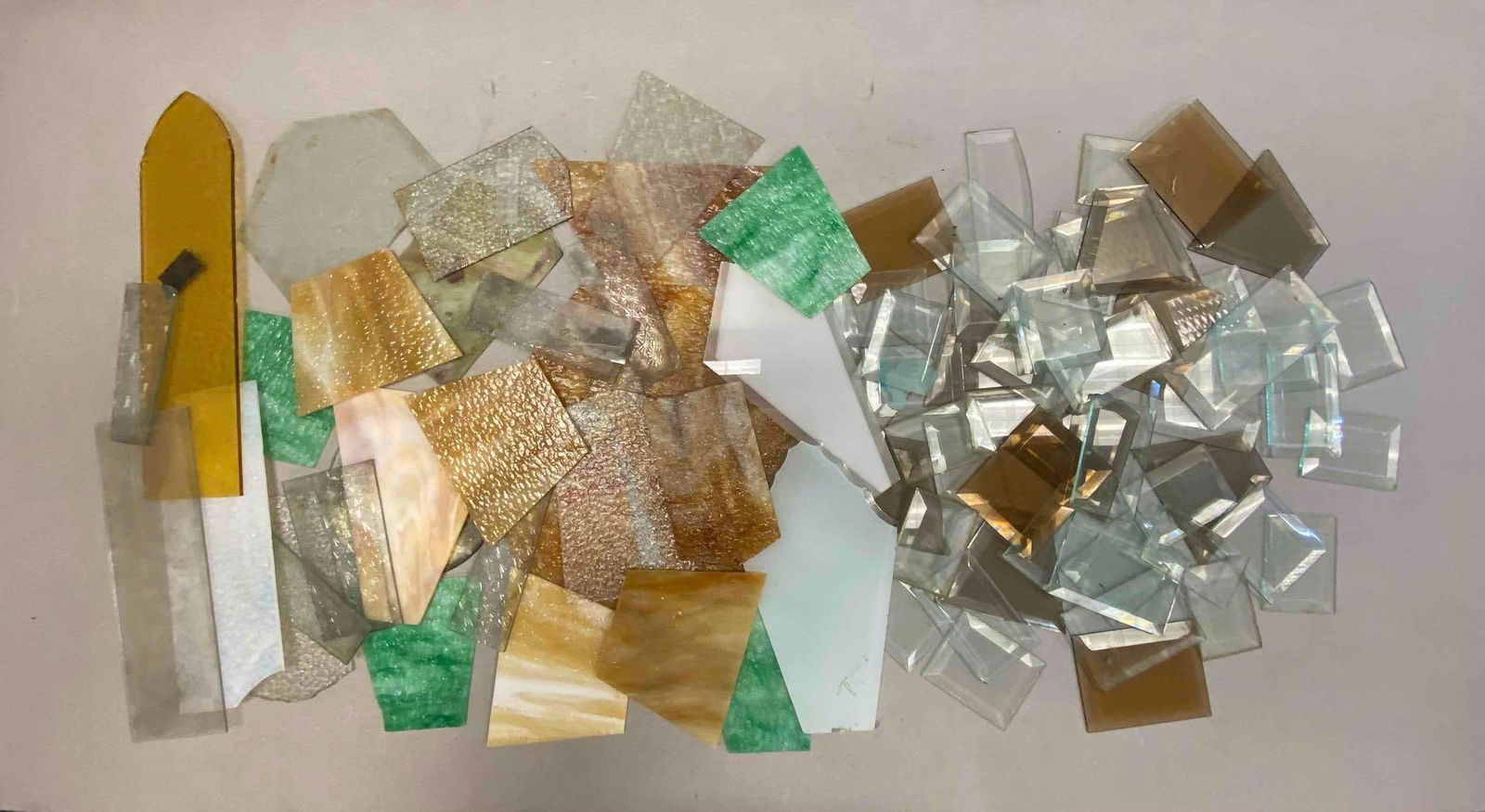 Group of Assorted Slag Cut Glass and More: Various shapes, colors, and sizes. Largest measures L 14 x W 4 inches. Chips and cracks throughout.