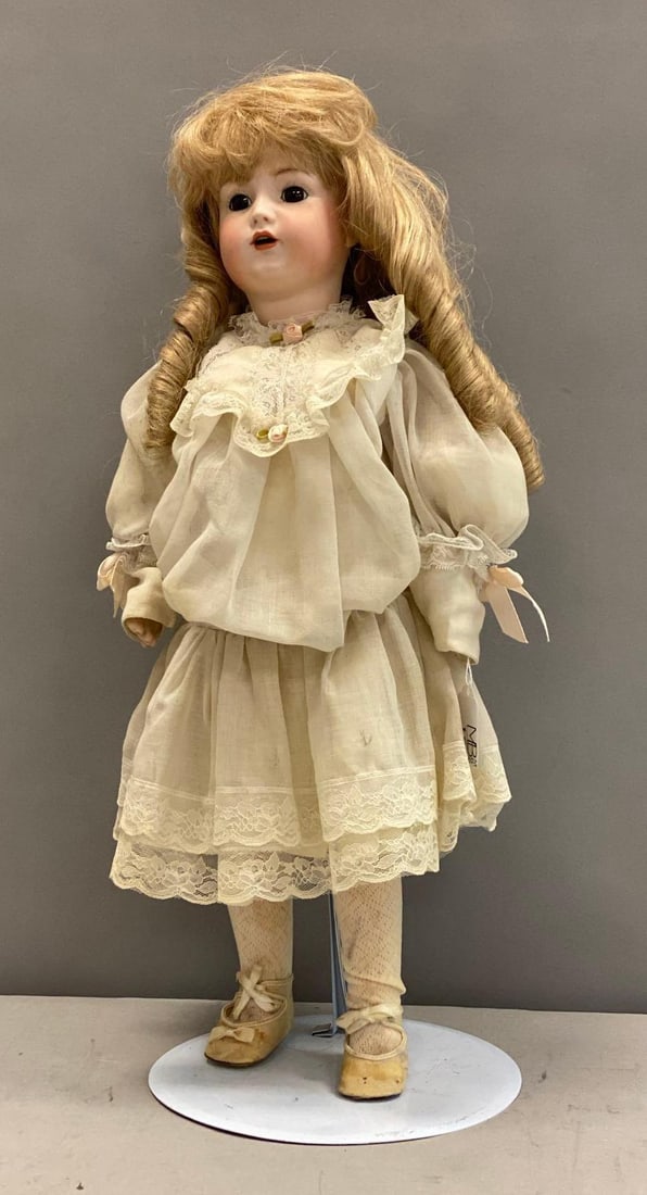 Antique Simon and Halbig German Bisque Child Doll: Mfg by Simon and Halbig. Measures 21” tall.
