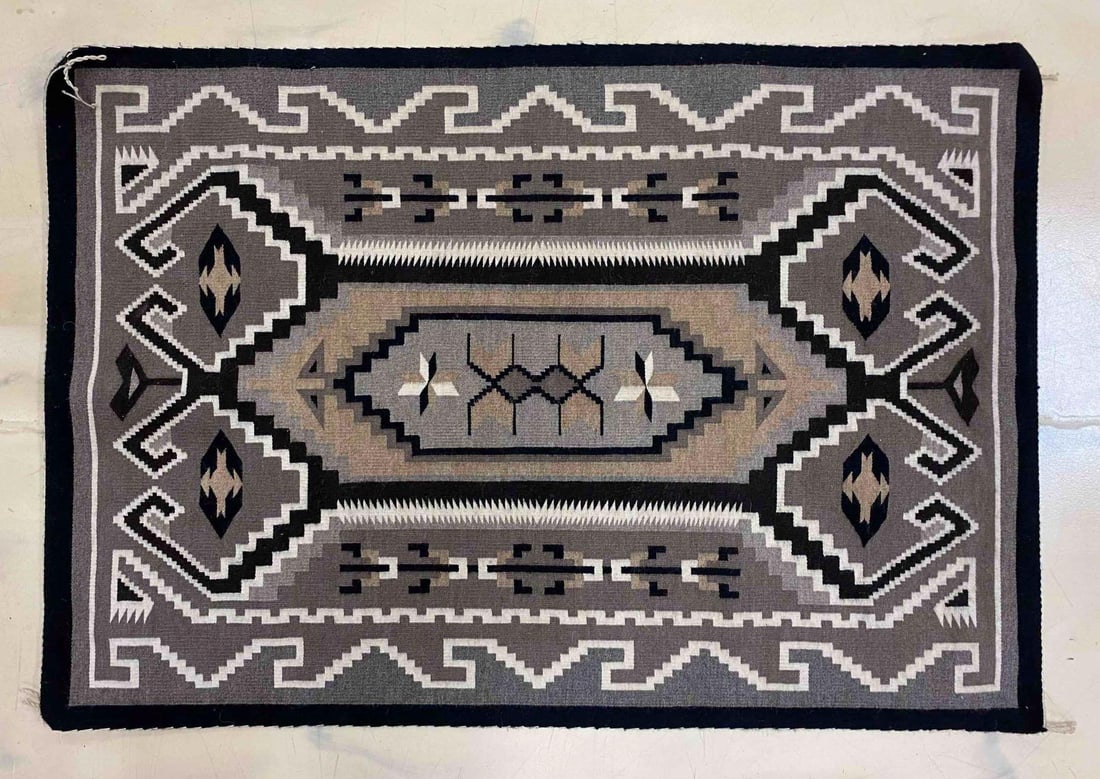 Native American Handwoven Rug: Measures L 47 x W 27 inches.