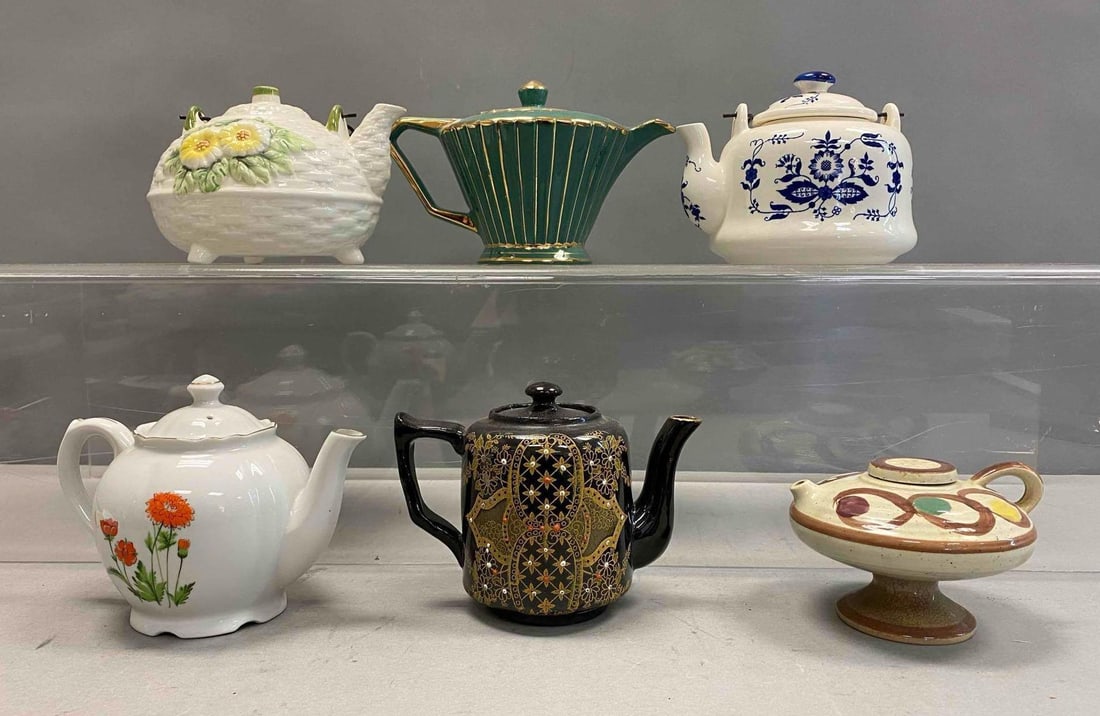 Group of 6 Ceramic Tea Kettles and More: Includes floral design, stoneware, and more. Largest measures H 5 x W 6”