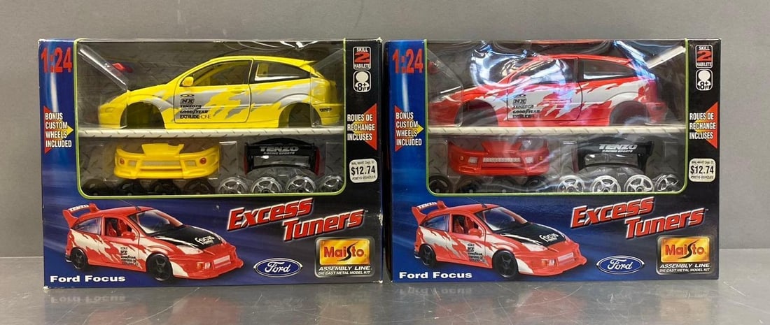 Group of 2 Vintage Maisto Excess Tuners Ford 1:24 Scale Die Cast Vehicles: Like new in original packaging. One measures H 6 1/2 x W 4 x L 9 inches.