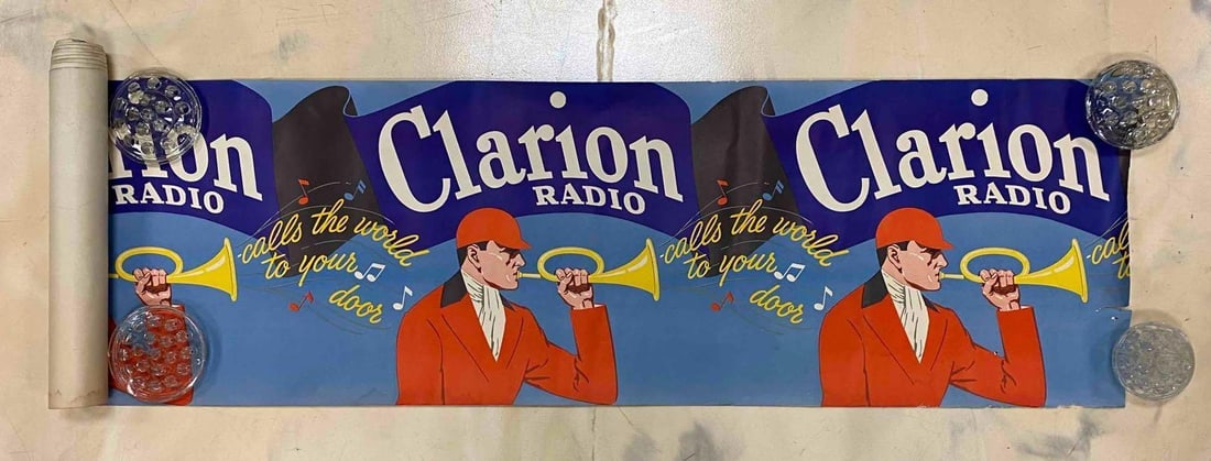 Vintage Clarion Radio Advertising Banner: Measure L 124 x W 17 inches when fully extended. Circa 1930’s. Poster holders not included.