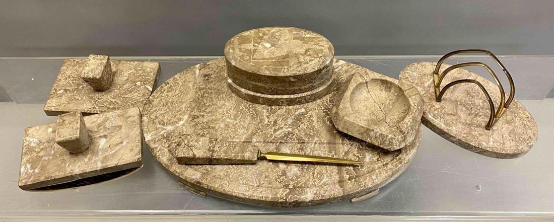 Group of Assorted Marble Office Desk Accessories: Includes letters holder, letter opener, ash tray, and more. Ashtray has crack that’s been previously repaired. Largest measures H 4 x W 9 x L 15 inches.