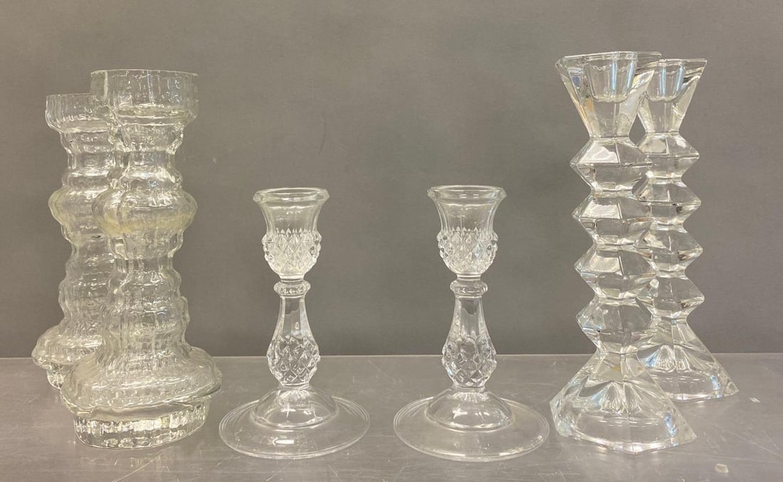 Group of Assorted Glass Candlesticks: Includes 3 Matching pairs. Largest measures 10” tall.