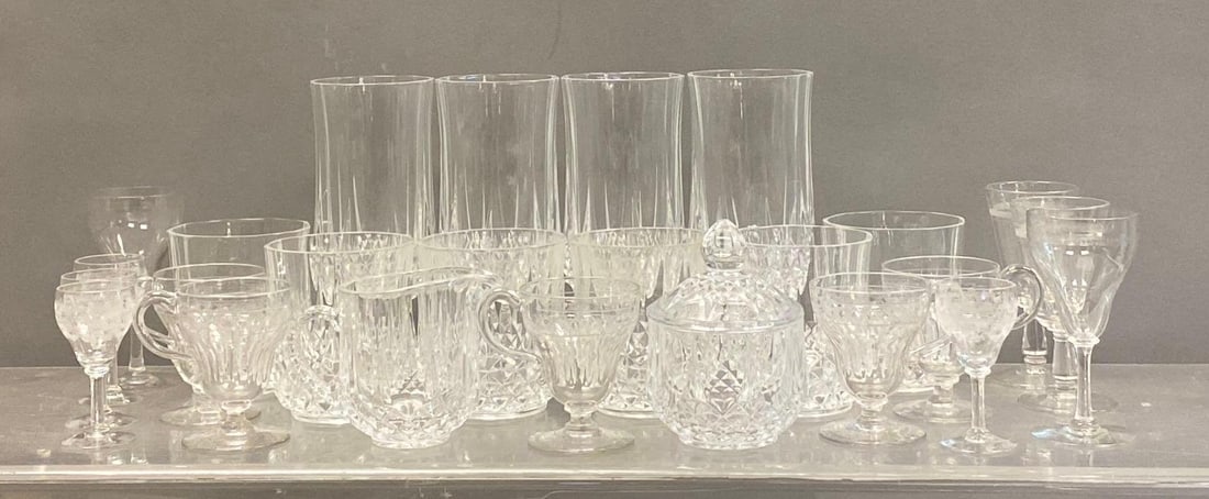 Group of Assorted Cut Glass Stemware and More: Includes whiskey Glasses, Tea cups, and more. Largest measures 7”. Some small chips throughout.