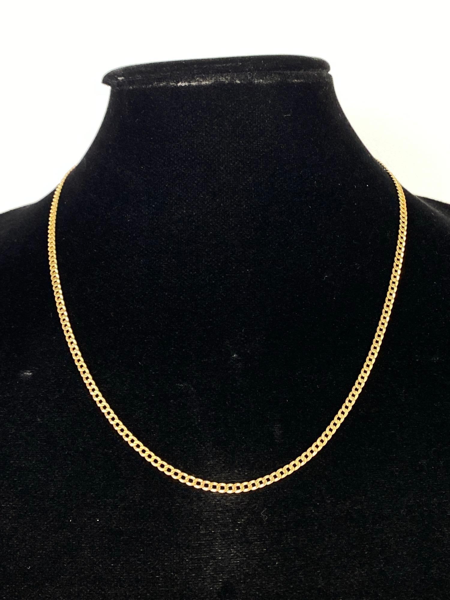 14K Gold Cuban Link Necklace: Total weight 10.9g, Measures 21 inches long.