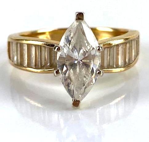 14K Gold Rhinestone Ring: Marquise and baguette cut, prong and channel set, 4.3g, size 6 1/2