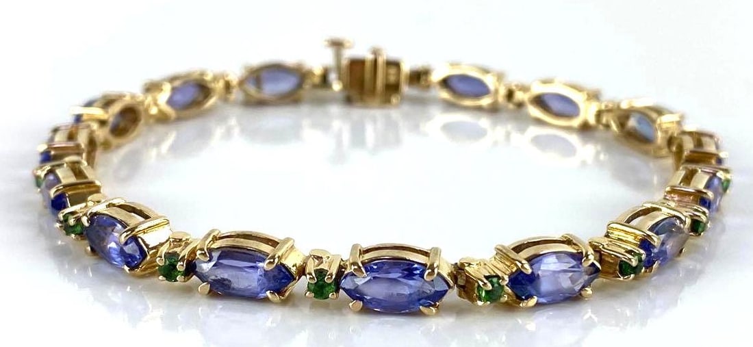 14K Gold Gemstone Bracelet: Marquise and round cut, prong set, 14.0g, measures 7 1/2 inches long