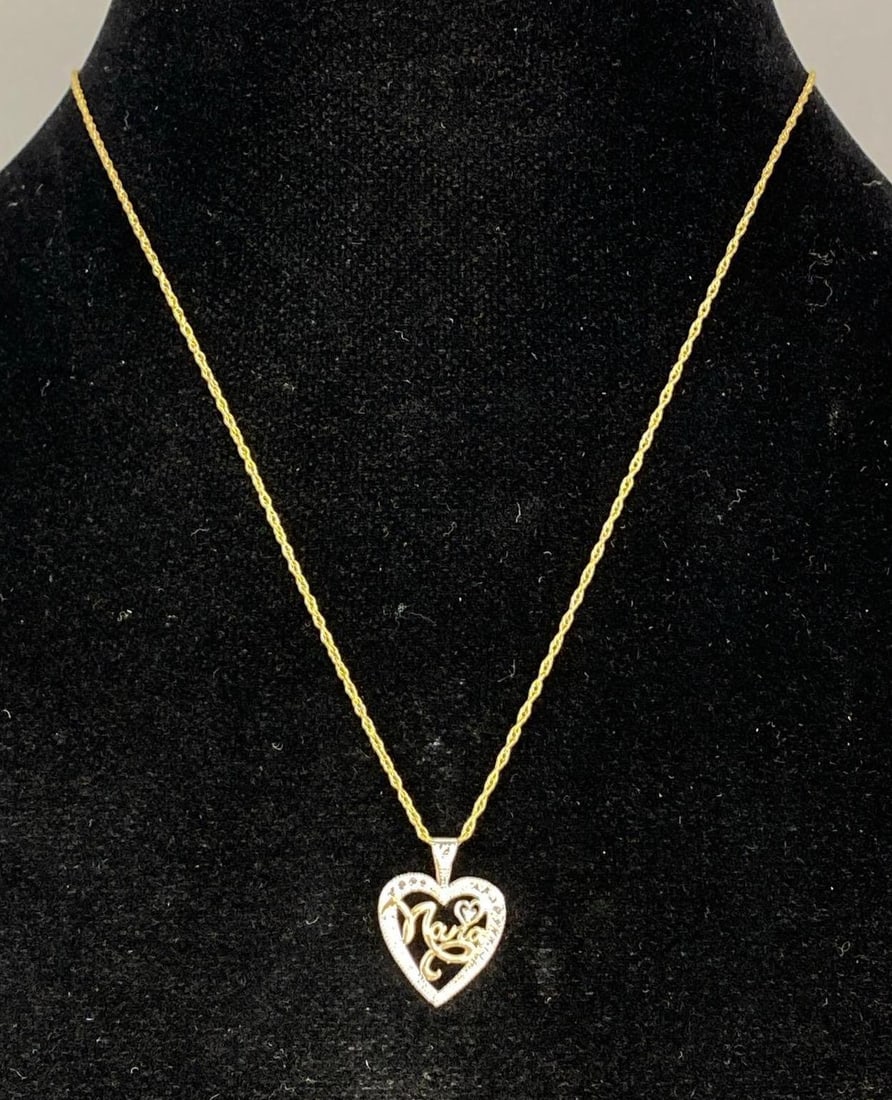 10K Yellow Gold and White Sapphire Nana Heart Necklace: Total weight 1.2 grams. Chain measures 18 inches in length.