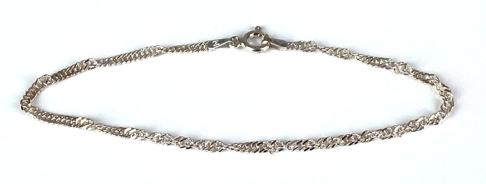 Sterling Silver Twisted Chain Bracelet: Measures 7 1/2” in length