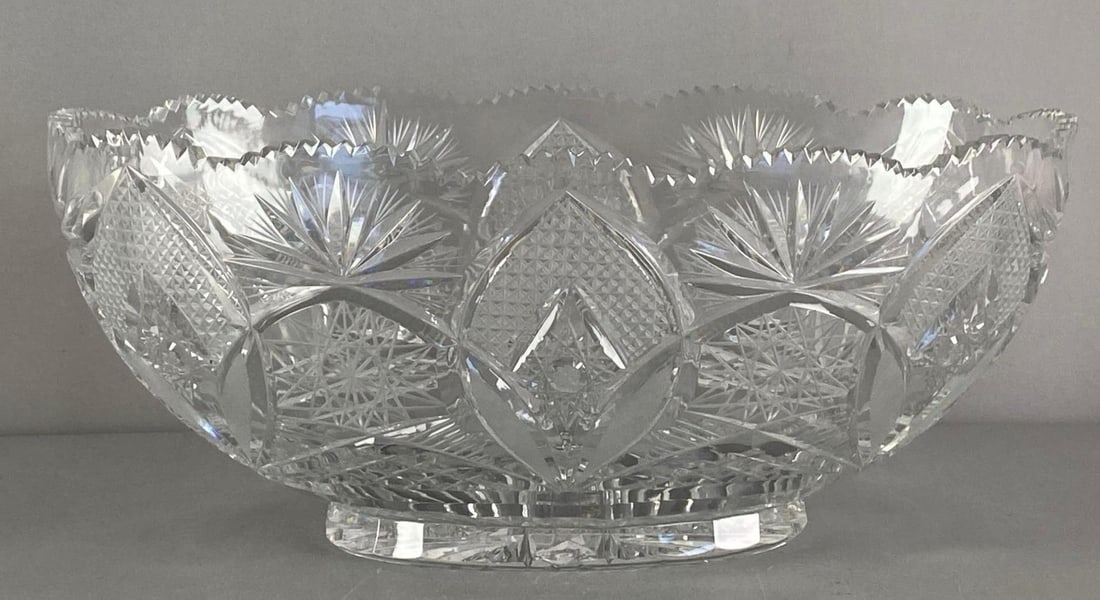 Vintage American Brilliant Cut Glass Bowl with Geometric Design: Hobstars, crosshatches, and starburst, Measures 7” H x 16” W x 7 3/4” D