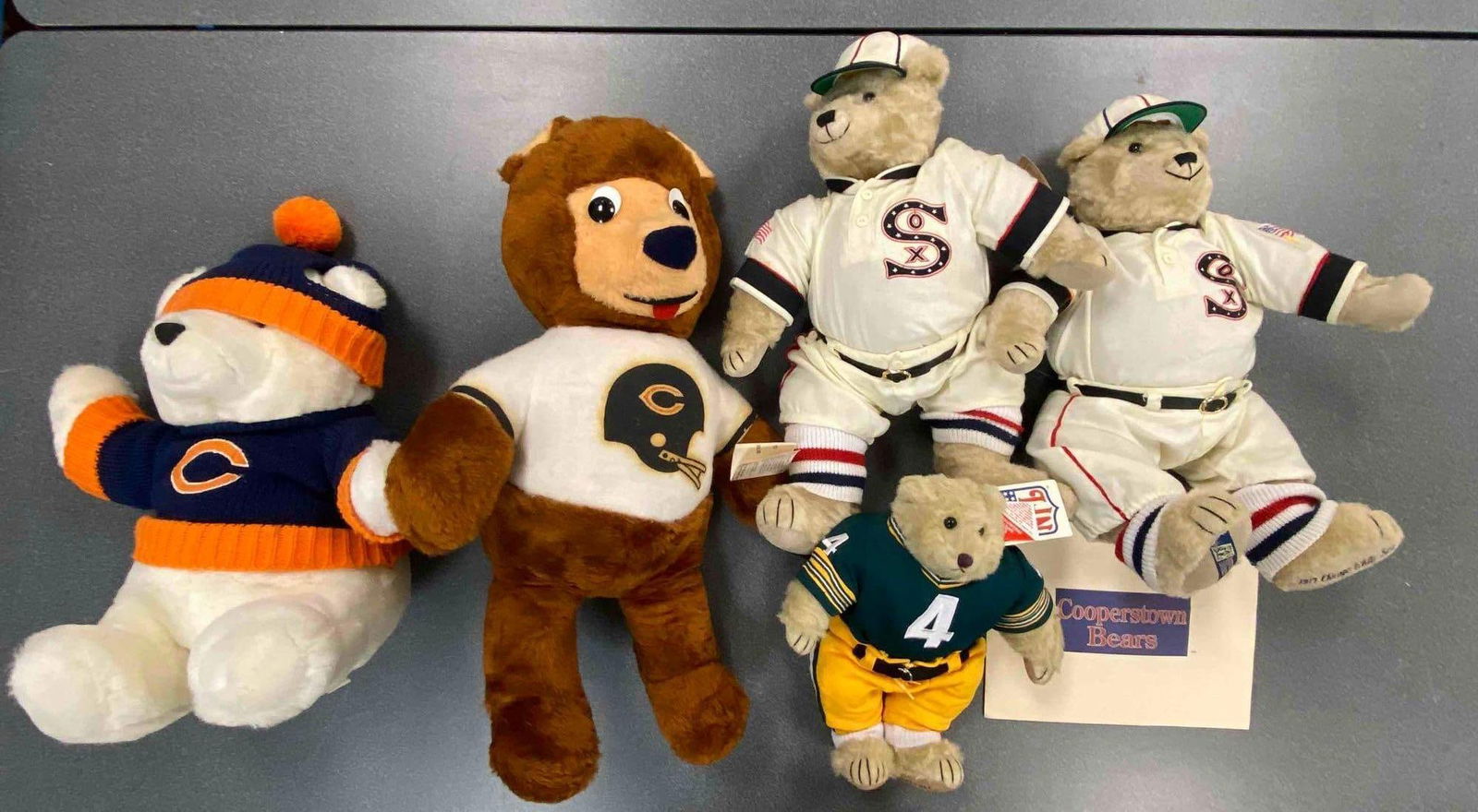 Group of Sports Teddy Bears: features 3 cooperstown bears, includes Chicago bears, Green Bay packers and Chicago white Sox, largest measures 25” H