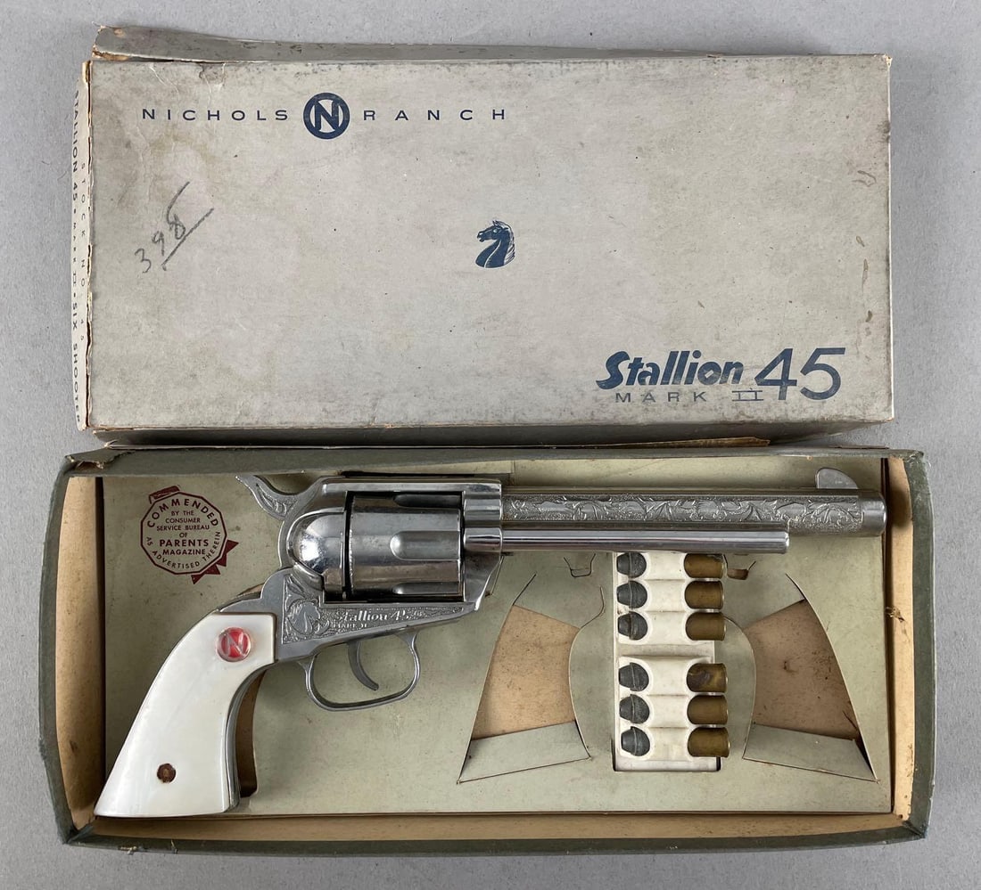 Vintage Nichols Ranch Stallion 45 Mark II Six Shooter Cap Gun: Includes original box and ammo belt clip, box measures 6" x 12 1/2" x 1 3/4"