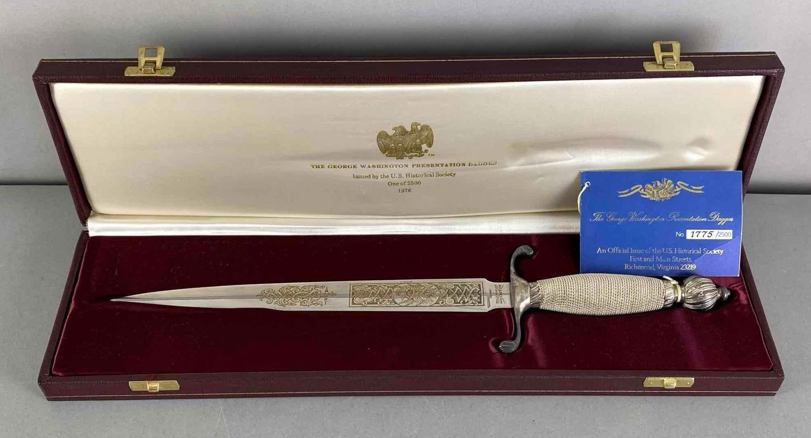 USHS LE George Washington Presentation Display Dagger: Forged by Wilkinson Sword, United States Historical society, limited edition No. 1775 of 2500, features gold filled etchings along spine, the pontil, guard, wire wrapped handle and ferrule are solid