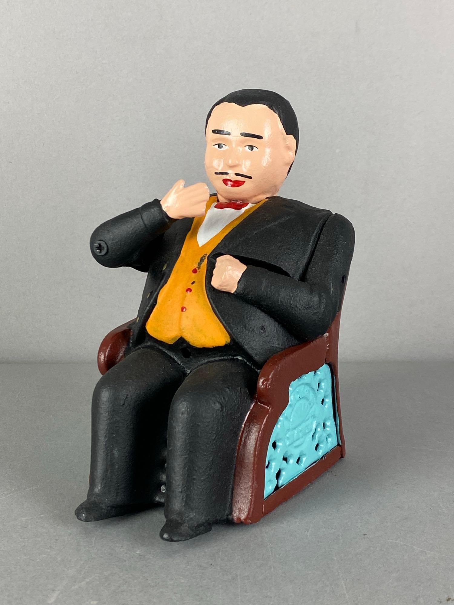 Vintage Reproduction Tammany Hall Mechanical Cast Iron Coin Bank: Repainted, missing bottom plug, measures 6” H x 3 1/2” W x 4 1/2” D