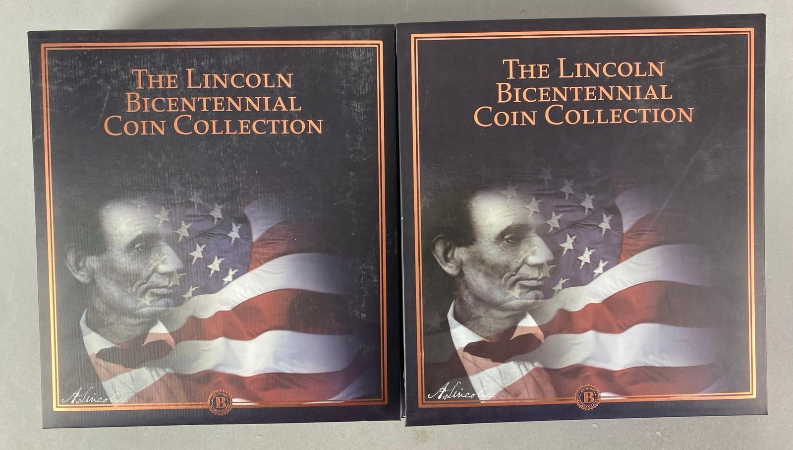 Group of 2 Volumes of The Lincoln Bicentennial Coin Collection Albums: Includes volume 2 and 4, unknown completion, each album measures 13” H x 12” W