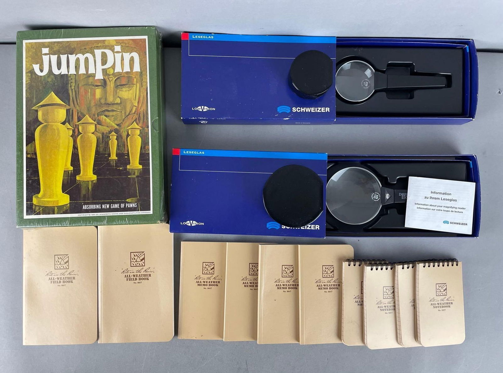 Group of All-Weather Notebooks and More: Includes jumpin game, magnifying glasses