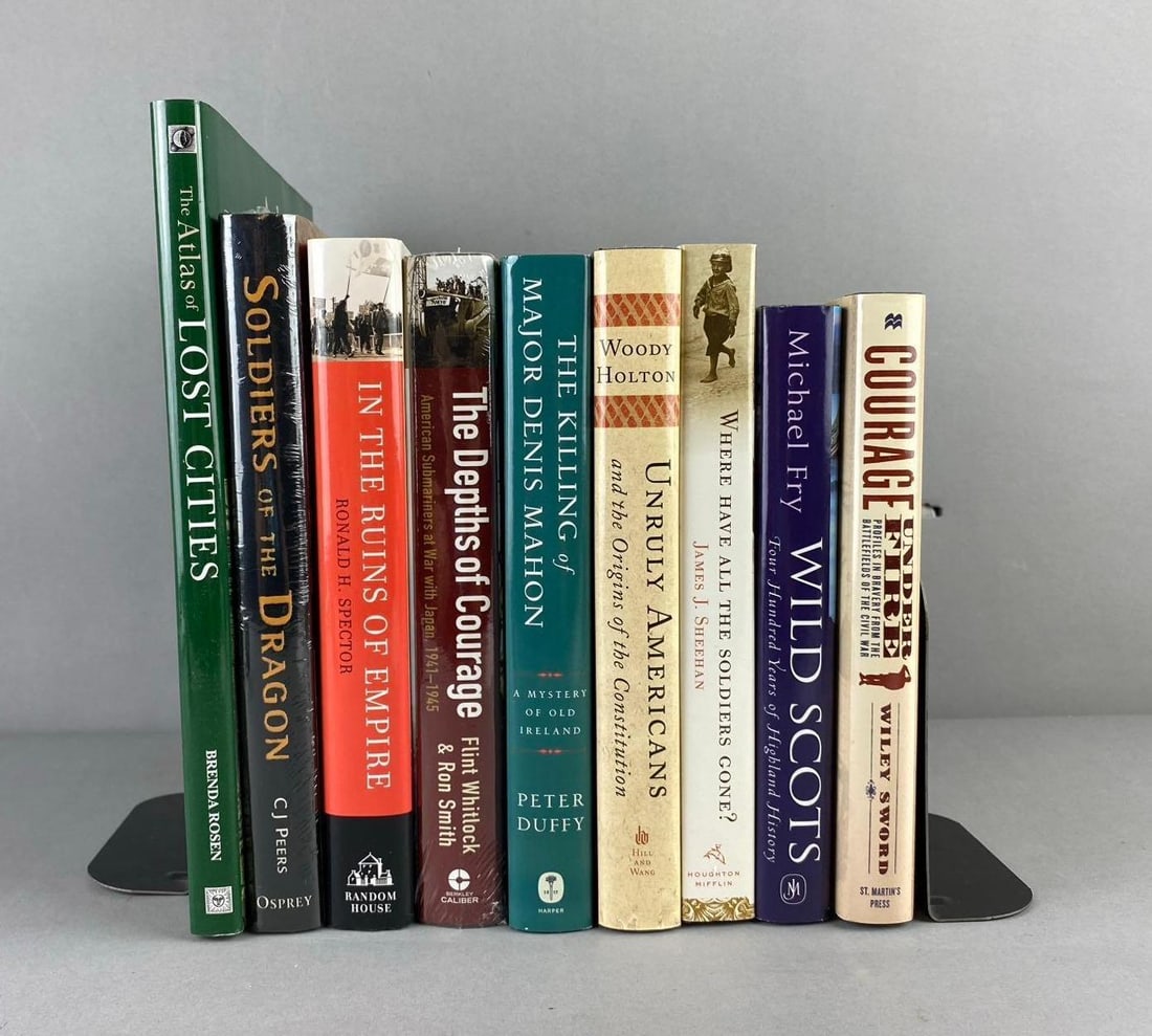 Group of Assorted Historical Military Books: Includes Unruly Americans, The Depths of Courage, and more. Largest book measures L 11 x W 10 inches.