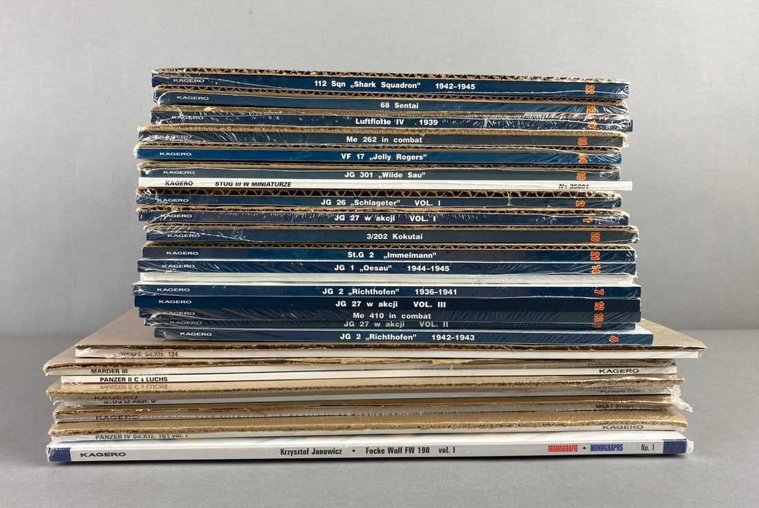 Group of Miniature Modeling Aircraft’s Books and More: Includes JG26, Luftlotte IV, and more. Like new in original packaging. Largest measures L 12 x W 9 inches.