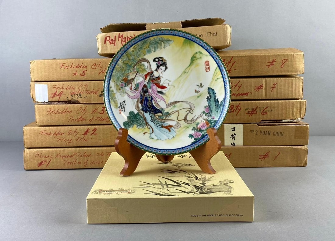 Group of 11 The Bradford Exchange Forbidden City Plates and More: Includes Wine Dragon, Floating Cups, and more. Like new in original packaging. One plate measures 8 1/2” in diameter. Plate stand not included.