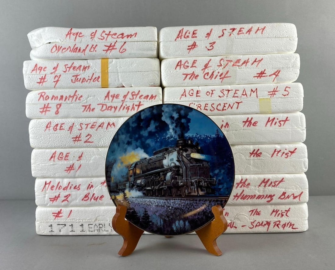 Group of 14 The Bradford Exchange Age of Steam Plates and More: Includes the daylight, the Chief, and more. Like new in original packaging. one plate measures 7 1/2” in diameter. Stand not included.