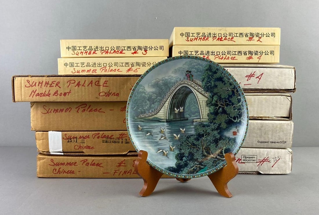 Group of 12 The Bradford Exchange Summer Palace Plates and More: Includes China Marble Boat, Czar Salton, and more. Like new in original packaging. One plate measures 7 1/2”. Stand not included.