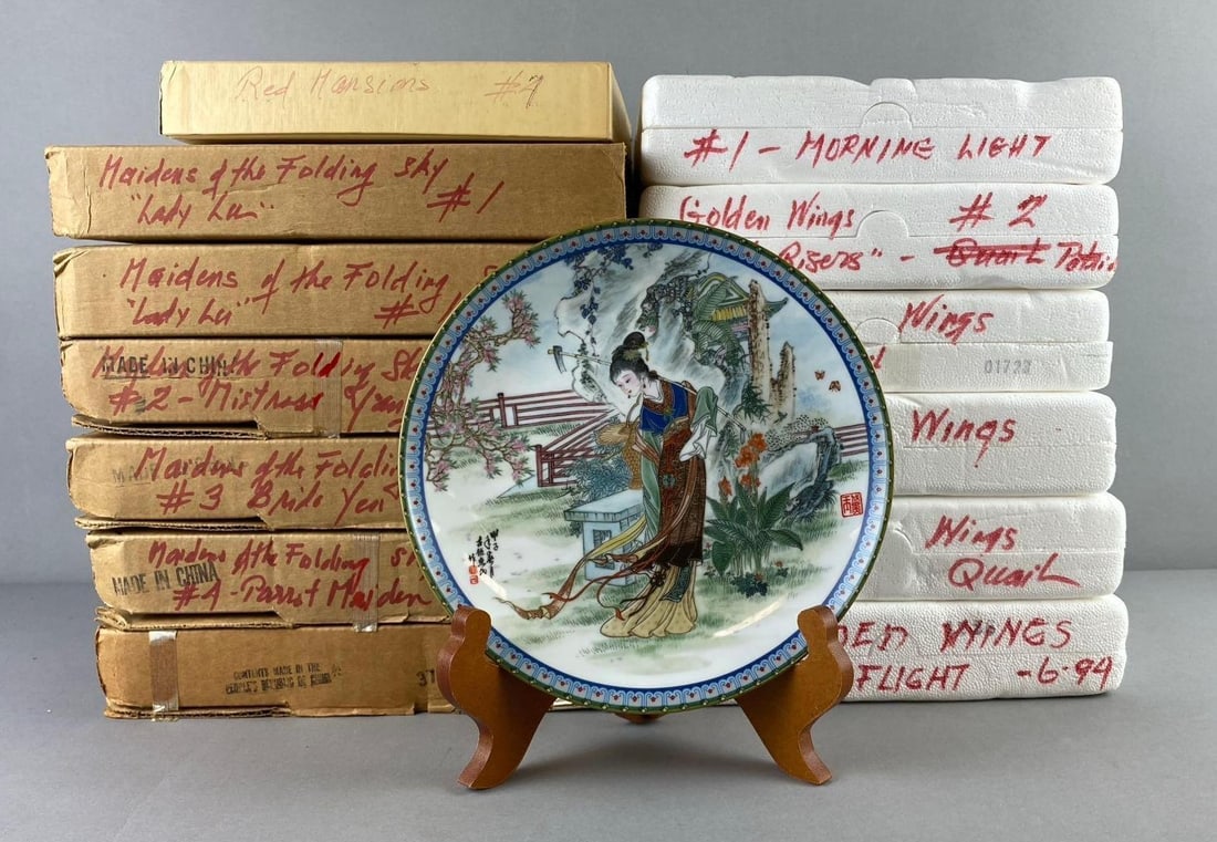 Group of 13 The Bradford Exchange Golden Wings and More: Includes Lady Lu, Morning Light, and more. Like new in original packaging. One plate measure 7 1/2”. Stand not included.