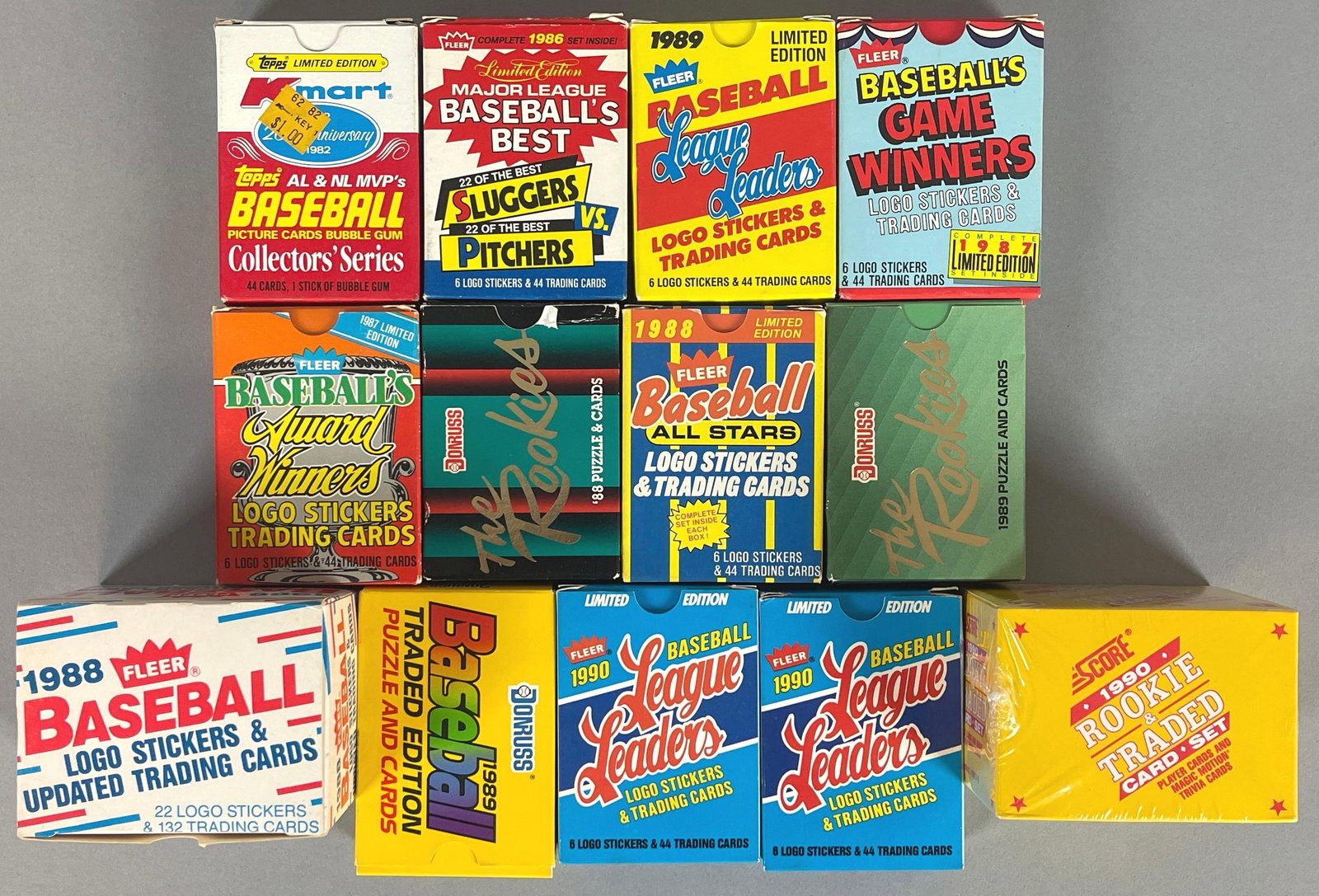 13 - 1982 - 1990 Assorted Baseball Traded and Leader Sets: 1982 K Mart Topps MVPs, 87 - Fleer Award Winners, 88 -Fleer All-Stars, 1990 League Leaders and More