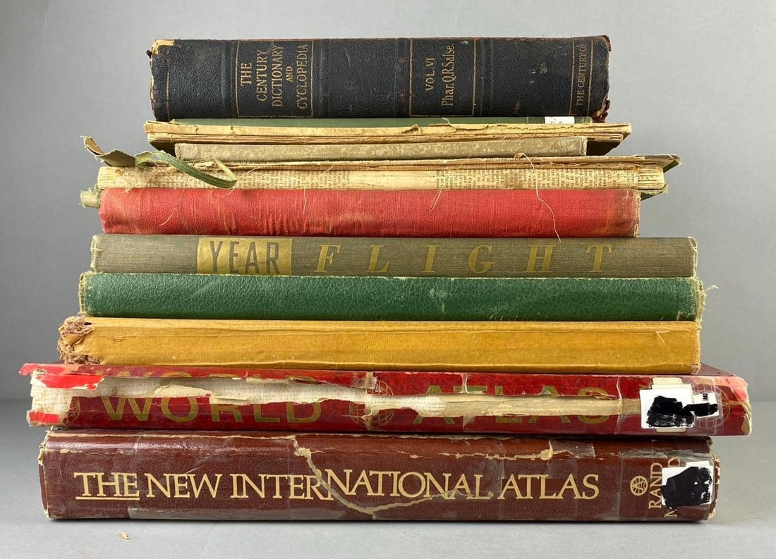 Group of Assorted World Atlas and More: Includes 1941 Atlas of the World, International Atlas, and more. Largest measures L 15 x W 11 inches. Rips and tears throughout.