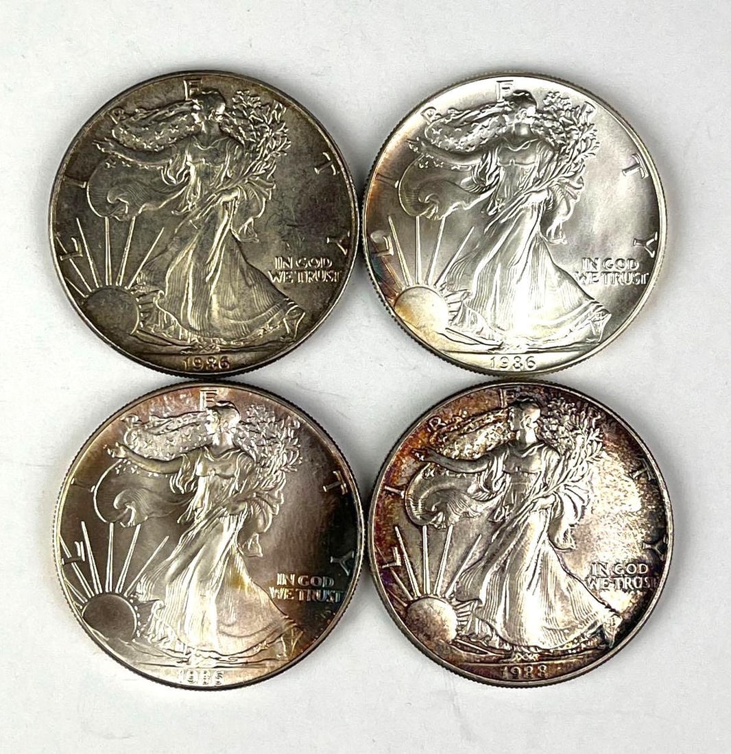 Group of 4 US $1 American Silver Eagle 1 oz .999 Coins: Includes years 3 1986 and 1988