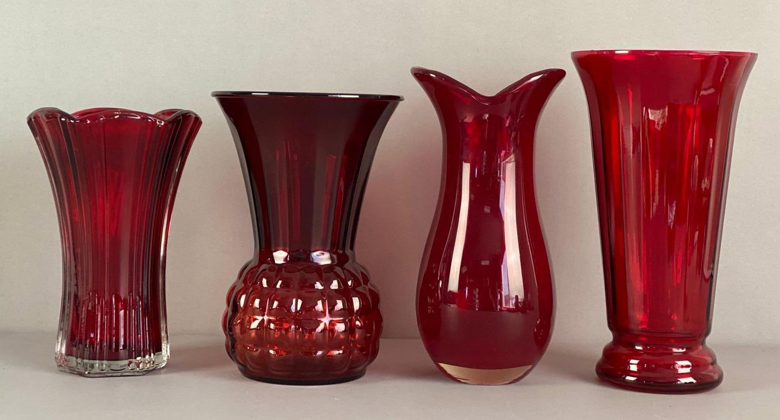 Group of Ruby Glass Vases: Largest measures 10 1/2? H x 6? W