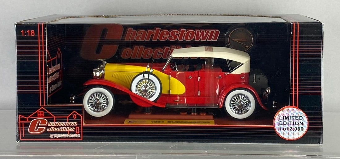 2007 Charlestown Collectables 1934 Duesenberg 1:18 Scale Die Cast Vehicle: Like new in original packaging. Measures H 6 x W 8 x L 16 inches.