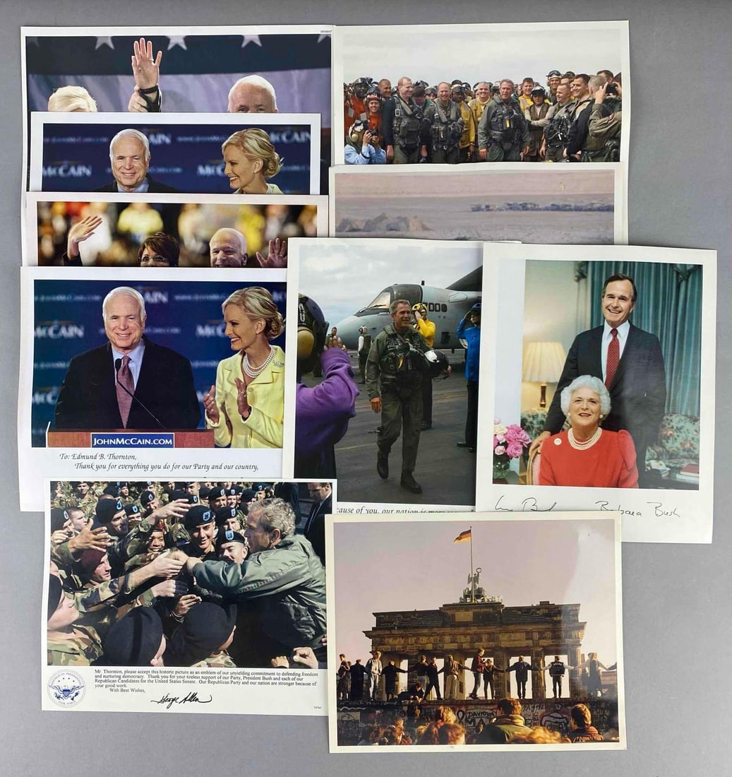 Group of Assorted US Former Presidents George W. Bush Photo Prints and More: Includes Bush USS Lincoln Welcome, John and Cindy appreciation prints, and more. Largest measures L 8 1/2 x W 10 1/2 inches.