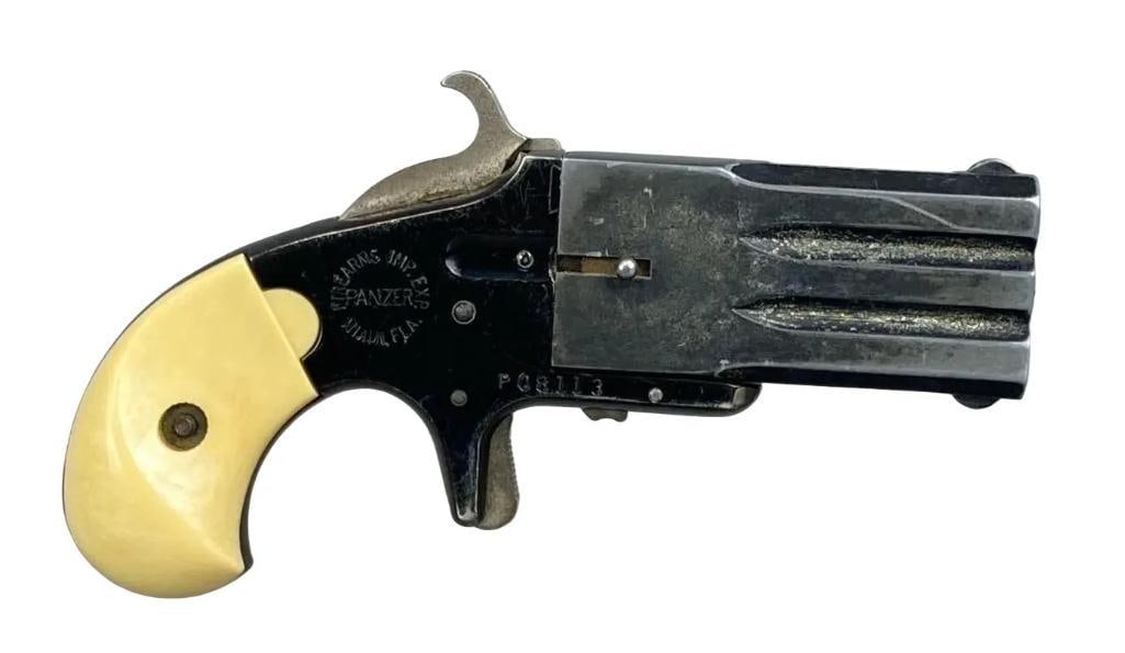 Panzer .22 Cal 2 Shot Twist-Barrel Derringer Pistol: S/N: P08113. 2 1/2” Barrel Length.