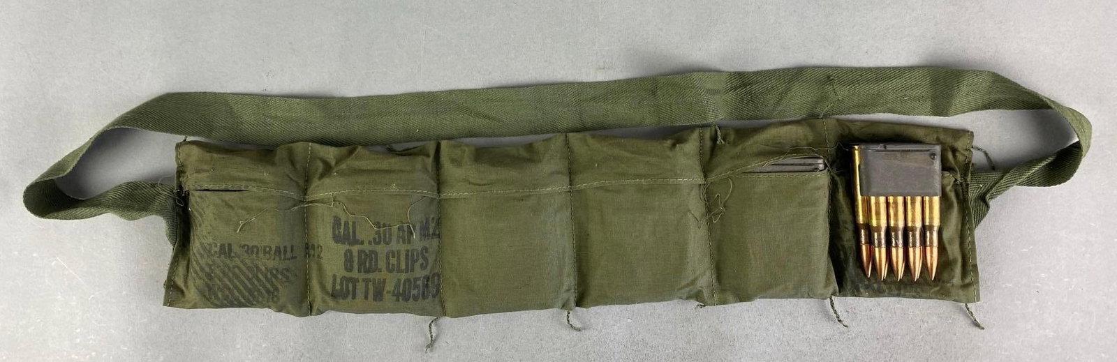 US Military .30 Cal Bandolier with Clips: 48 rounds total, includes 6 - 8 round clips, bandolier measures 22” W