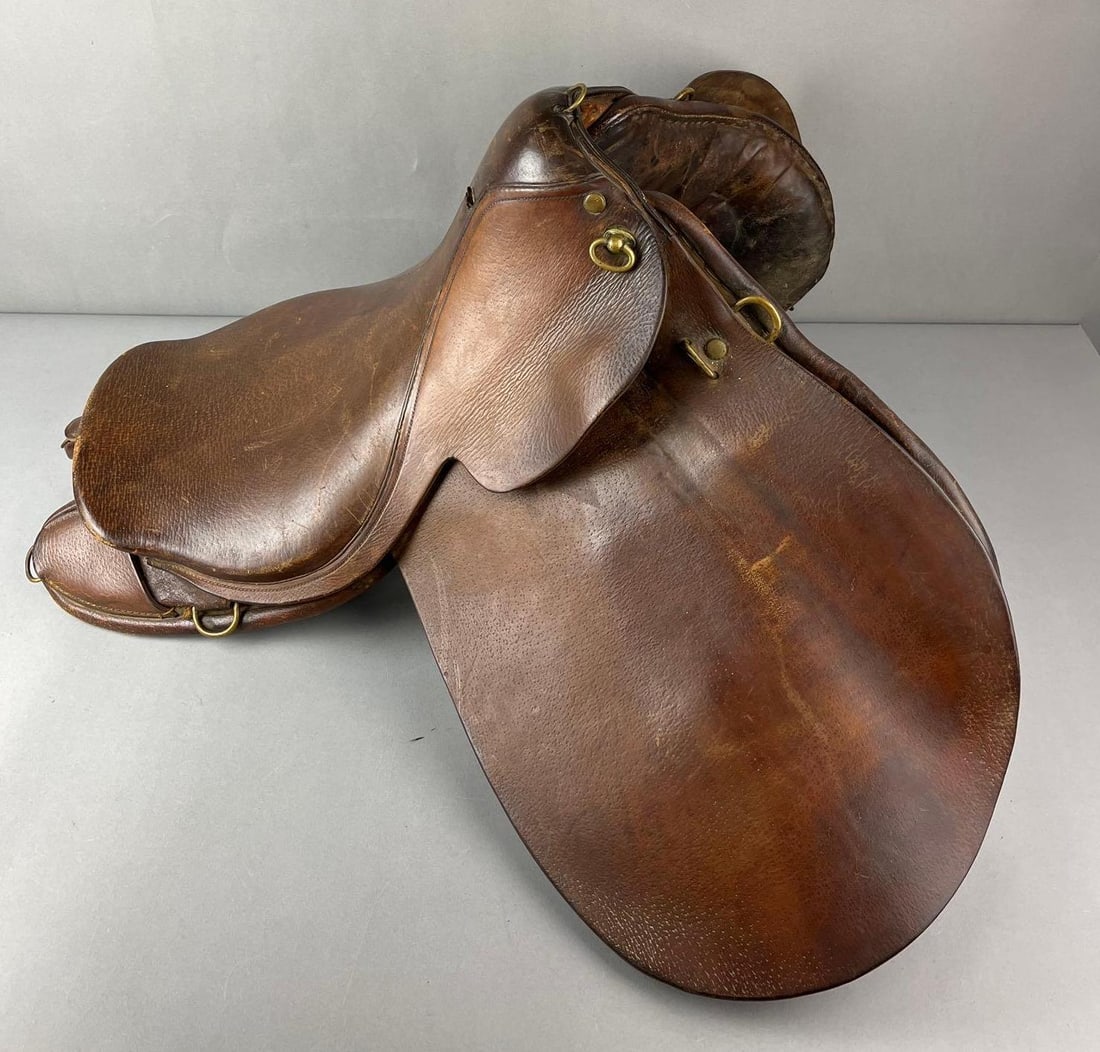 WW1 US WM G. Rothermel Colonel Calvary Leather Saddle: Wear is consistent with age. Measures H 14 x W 40x D 23 inches.