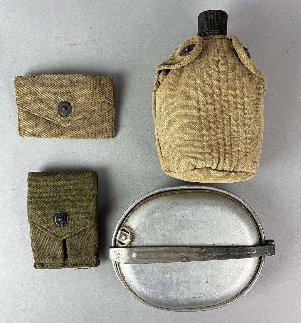Group of 4 US Military Items: Includes Pan, Canteen, first aid pouch and more. Largest item measures H 8 x W 6 x D 3 1/2inches.