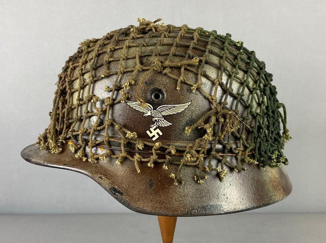 Reproduction German Style Single Decal Luftwaffe DAK M35 Helmet: Missing liner. Marked Q64 and DN353 inside. H 6 x W 9 x L 11 inches. Stand not included.