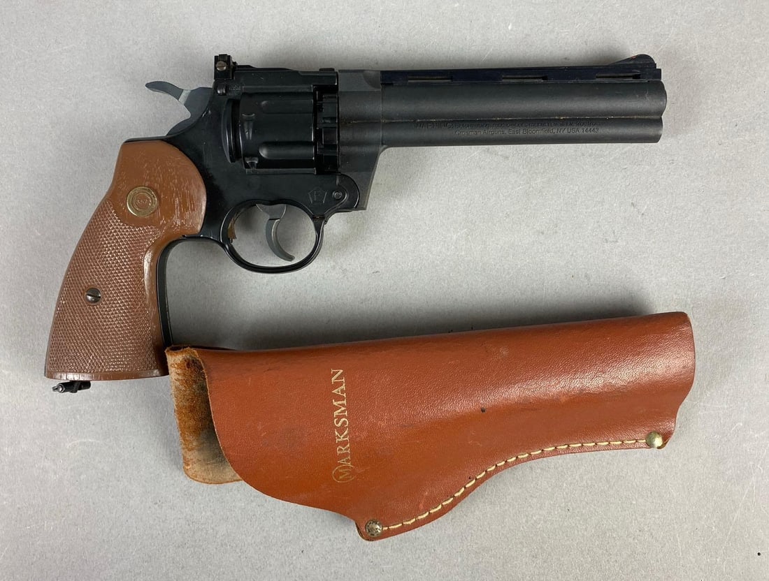 Vintage Crosman Airgun 357 Magnum Style CO2 177 Cal. Pellet Gun: Untested. Comes with magazine and holster. Measures 11” in length.