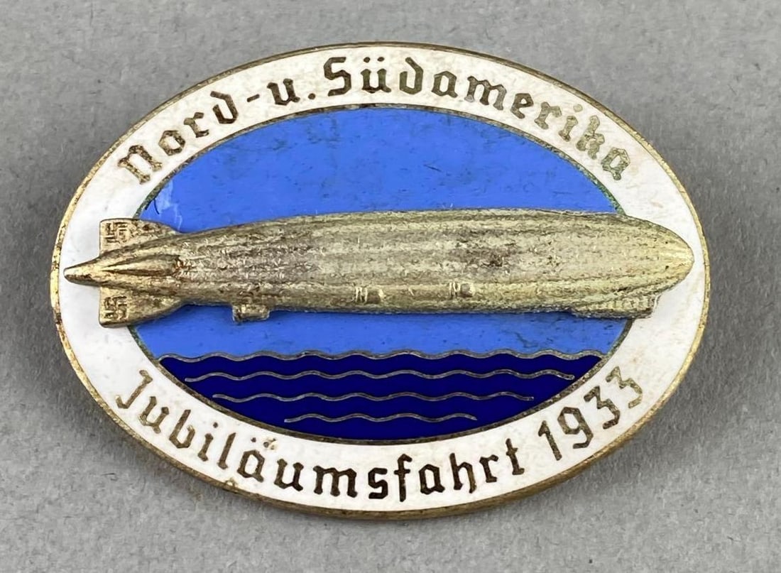WW2 1933 German Graf Zeppelin Commemorative Badge: North and South American Anniversary Flight of 1933. Mfg by Kerbach Dresden. Measures L 2 x W 1 1/2 inches.