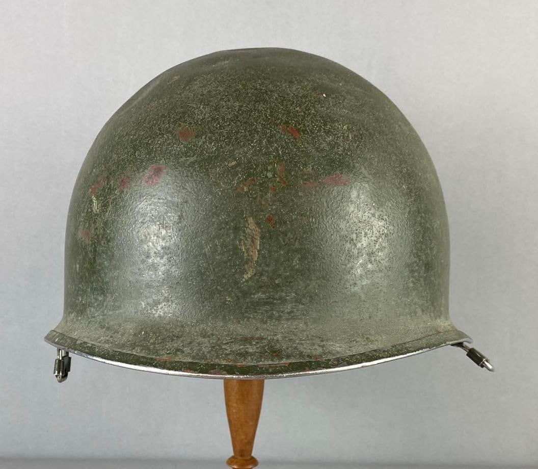 Israel Defense Force Kasda M1 Combat Helmet Shell: Multiple Dent on topside with light rust throughout. Circa 1970’s. Measures H 6 x aw 9 x L 11 inches. Stand not included.