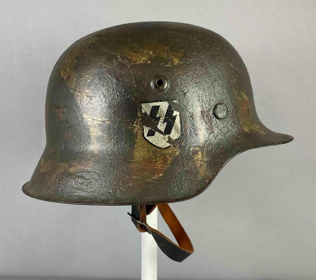 WW2 Altered German M42 Stahlhelm Helmet: Features a REPAINTED Normandy style paint scheme and SS Decal. Measured H 6 1/2 x W 10 x L 11 inches. Stand not included.
