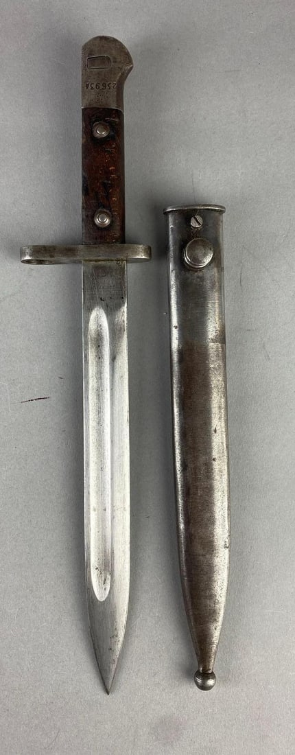 WW2 Turkish M1935 Mauser Bayonet and Scabbard: Light rust and pitting throughout. Measures 16” in length.