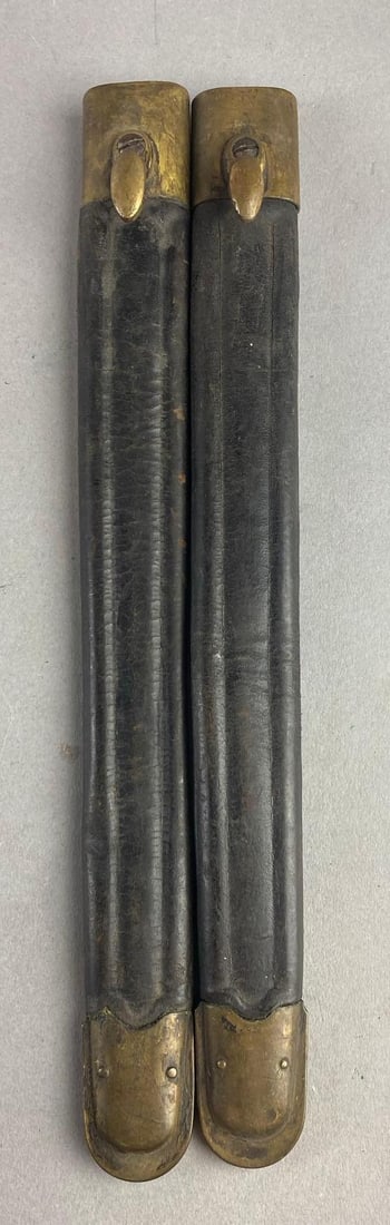 Group of 2 WW2 Italian 1891 Carcano Bayonet Scabbards: one measures 12” in length.
