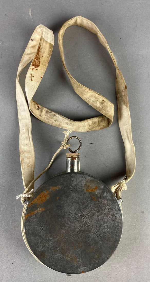 Replica Civil War Confederate Tin Drum Canteen: Measure 6” in diameter.
