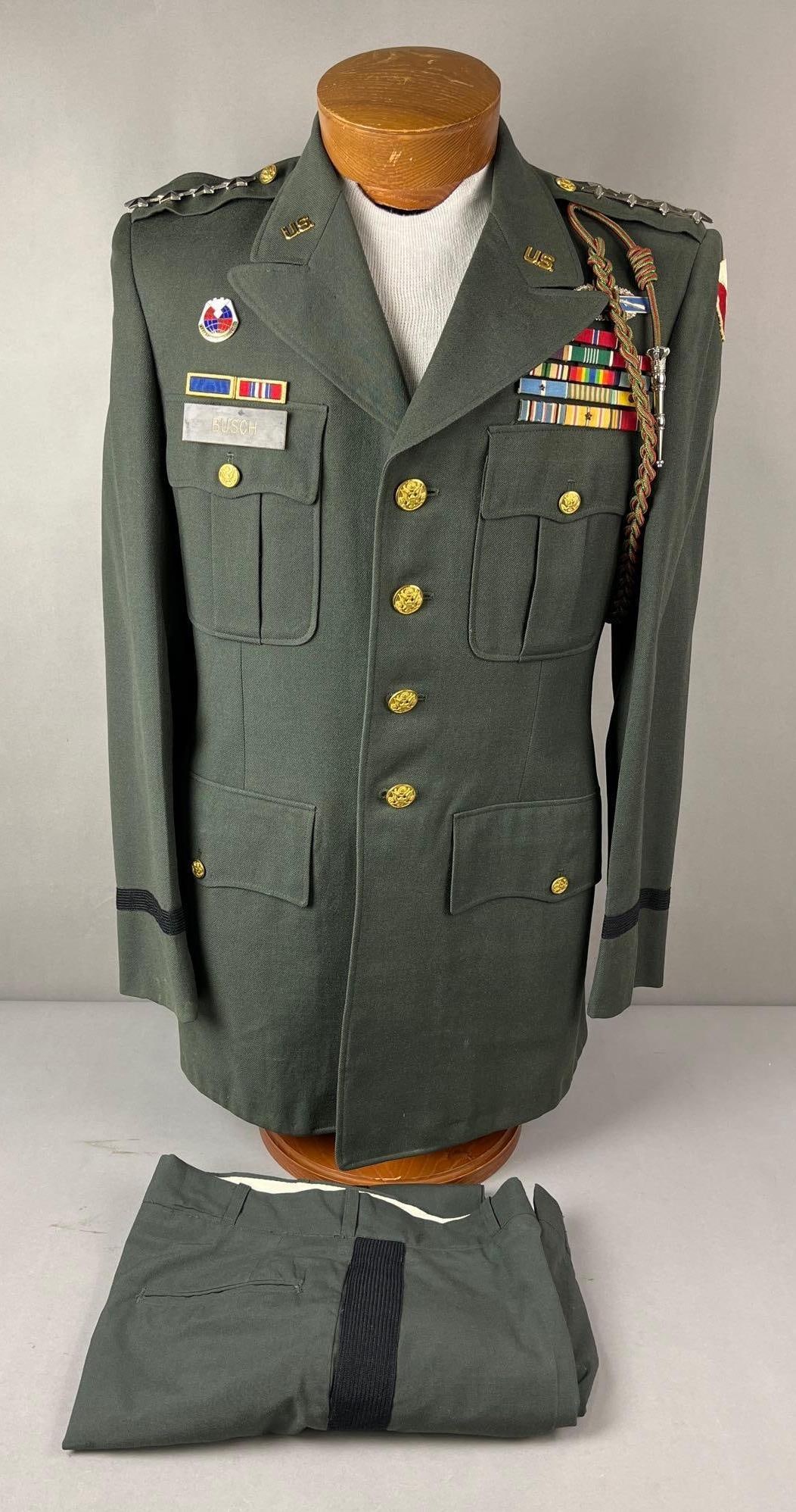 US Army Dress Jacket: Includes Material command patch, 4 star general shoulder bar, presidential unit citation ribbon and more. Size 36 L.
