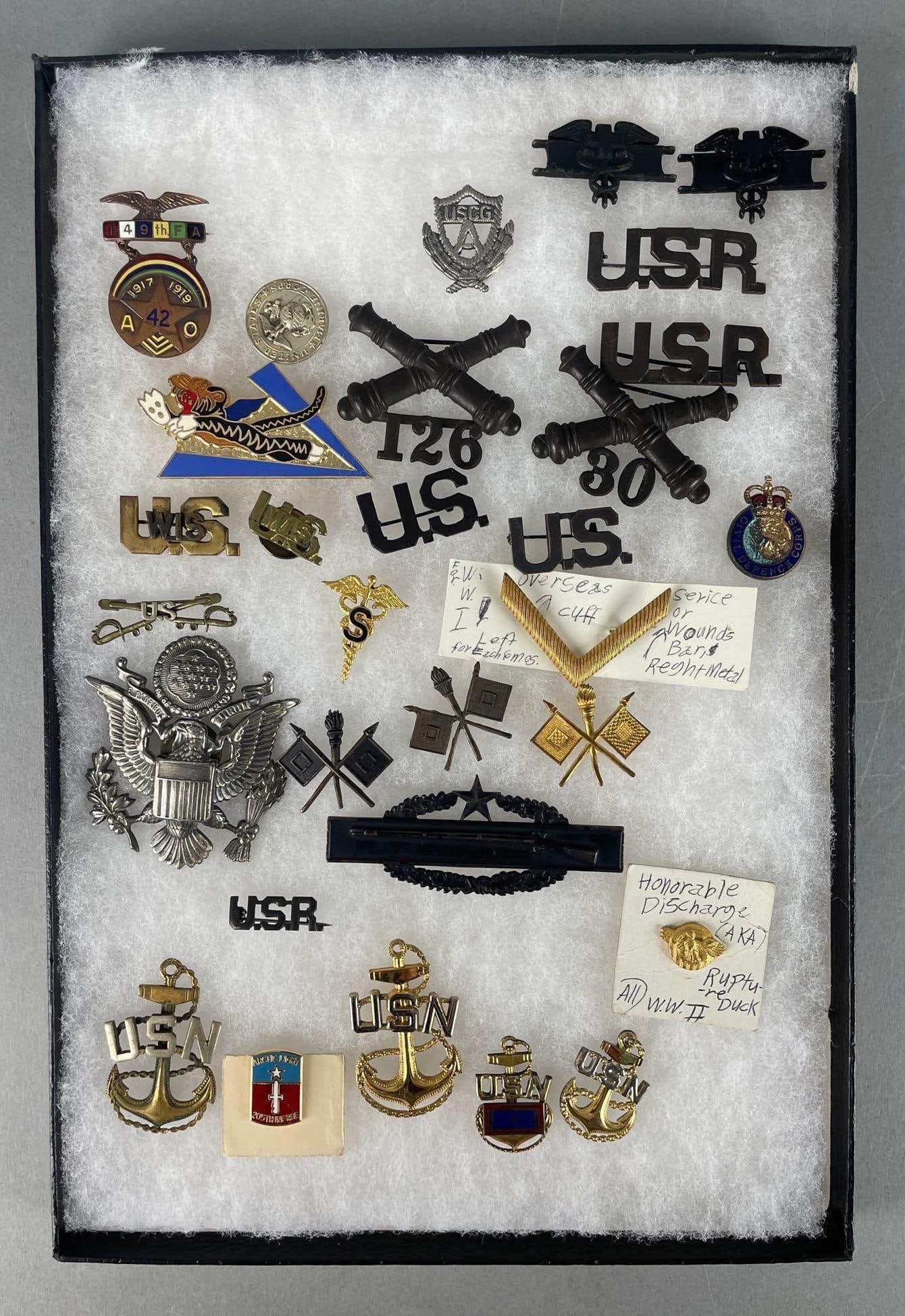 Group of U.S. Military Insignia and Badges: WW1 and WW2