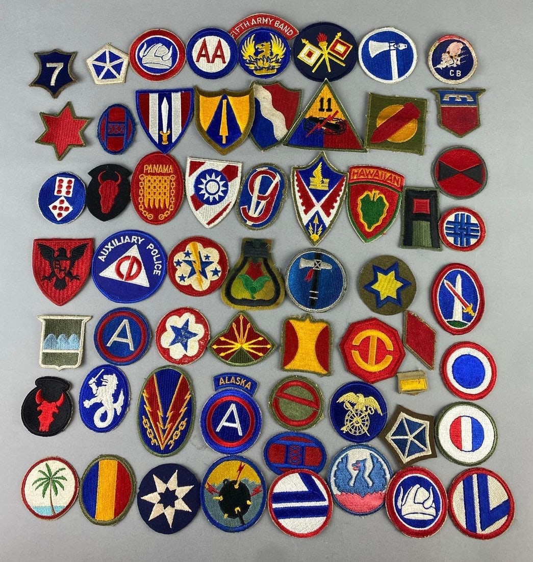Group of Assorted WW2 US Army Military Insignias Patches: Includes Officer rank, Hawaiian Division, and more. Largest measures 4” in length.