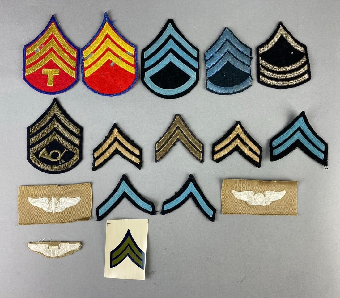 Group of Assorted WW2 US Army Military Insignias Patches: Includes Army Air Corps Navigator, Corporal, and more. Largest measures 4”