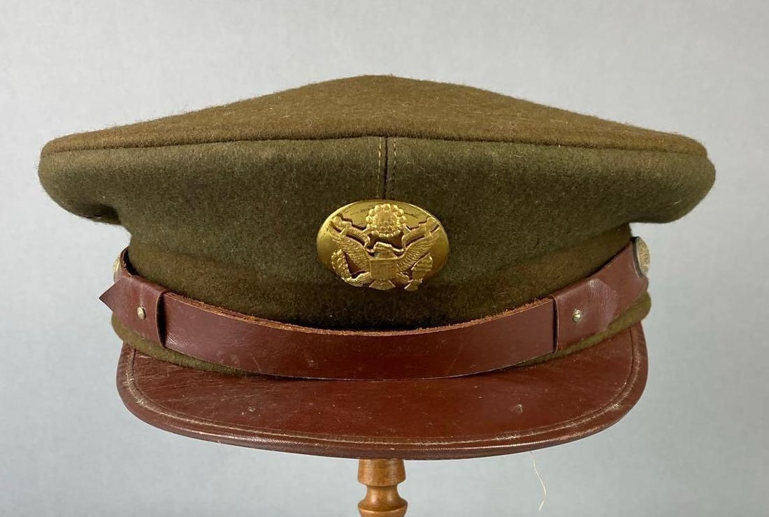 WW2 US Army Enlisted Visor Cap: Measures 7 1/8” stand not included.